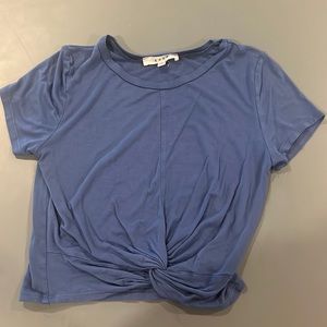 Blue shirt with knot on bottom